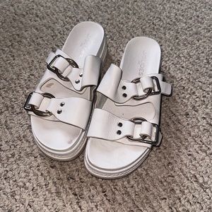 J Slides white platform